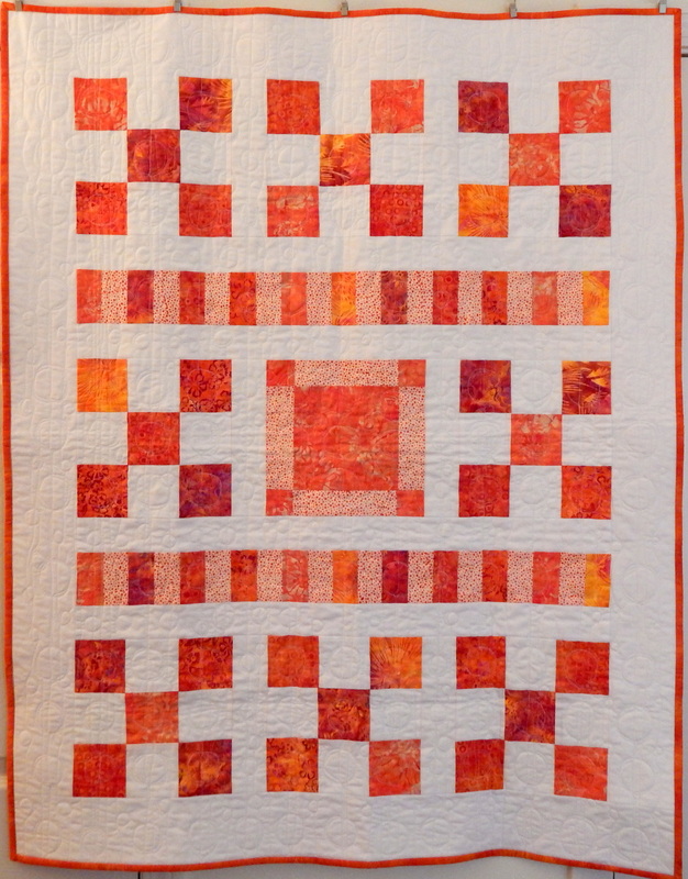 Simply handmade baby quilt 36 x 46 in orange and white